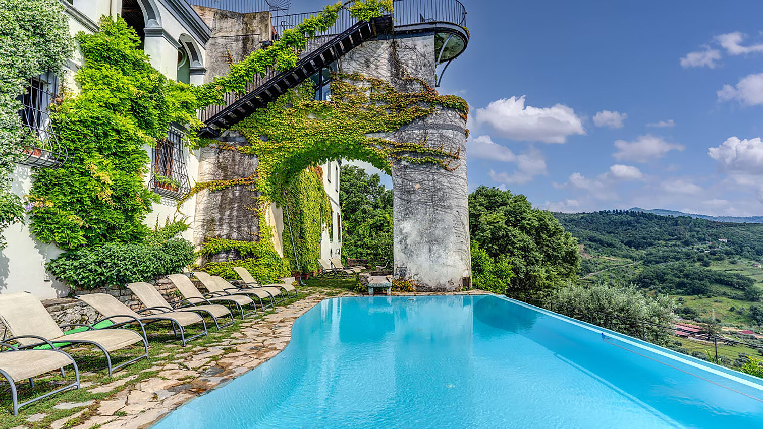Infinity pool overlooking the coastline at a resort along the route