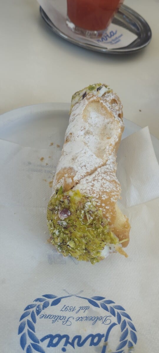 Traditional Sicilian cannolo, a sweet stop along the tour