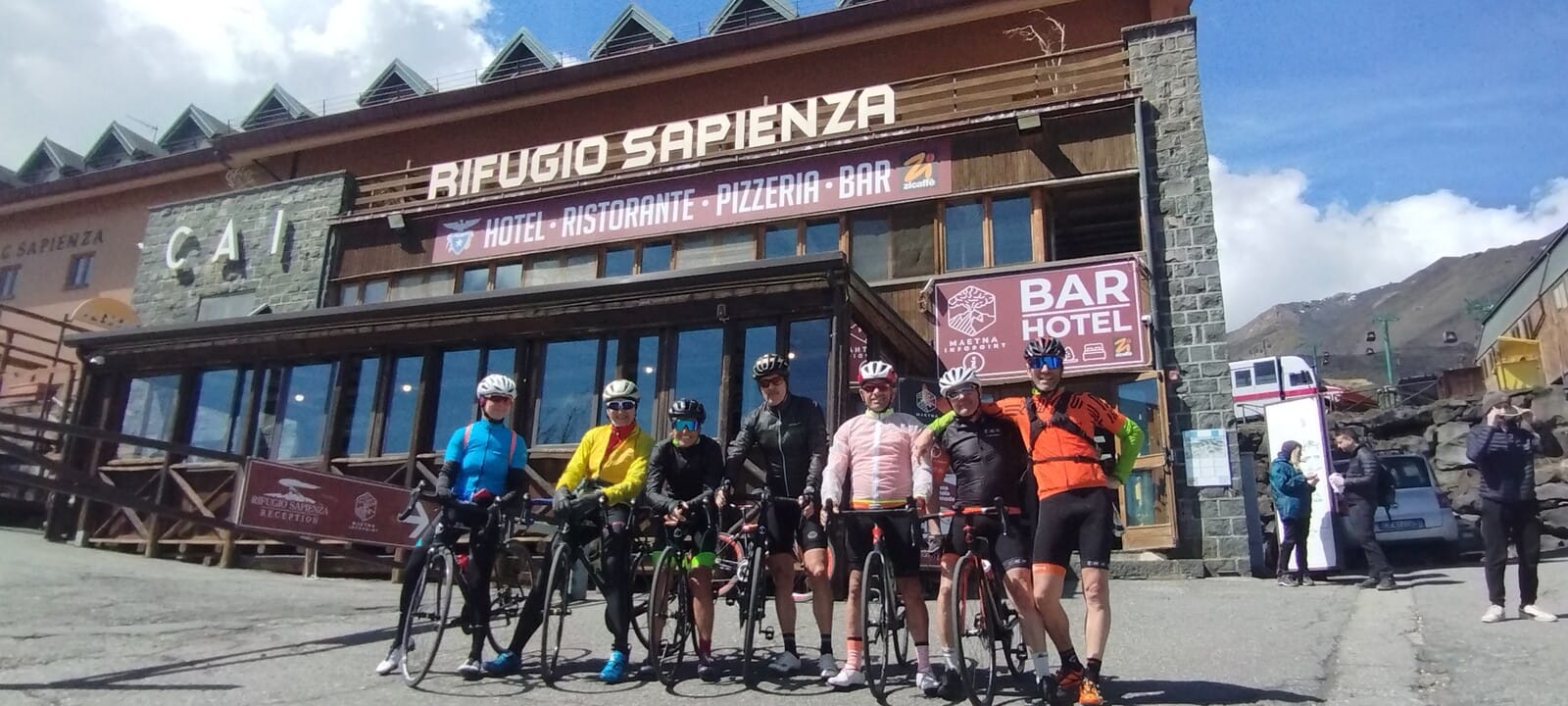 Group of cyclists at the Rifugio Sapienza on Mount Etna