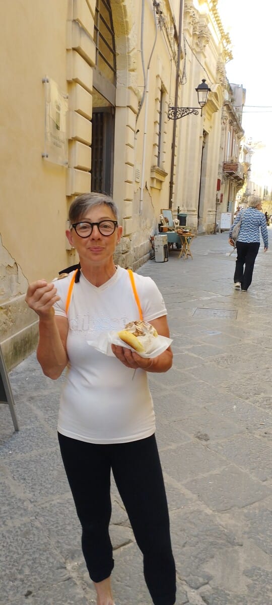 Tasting local street food in a Sicilian village