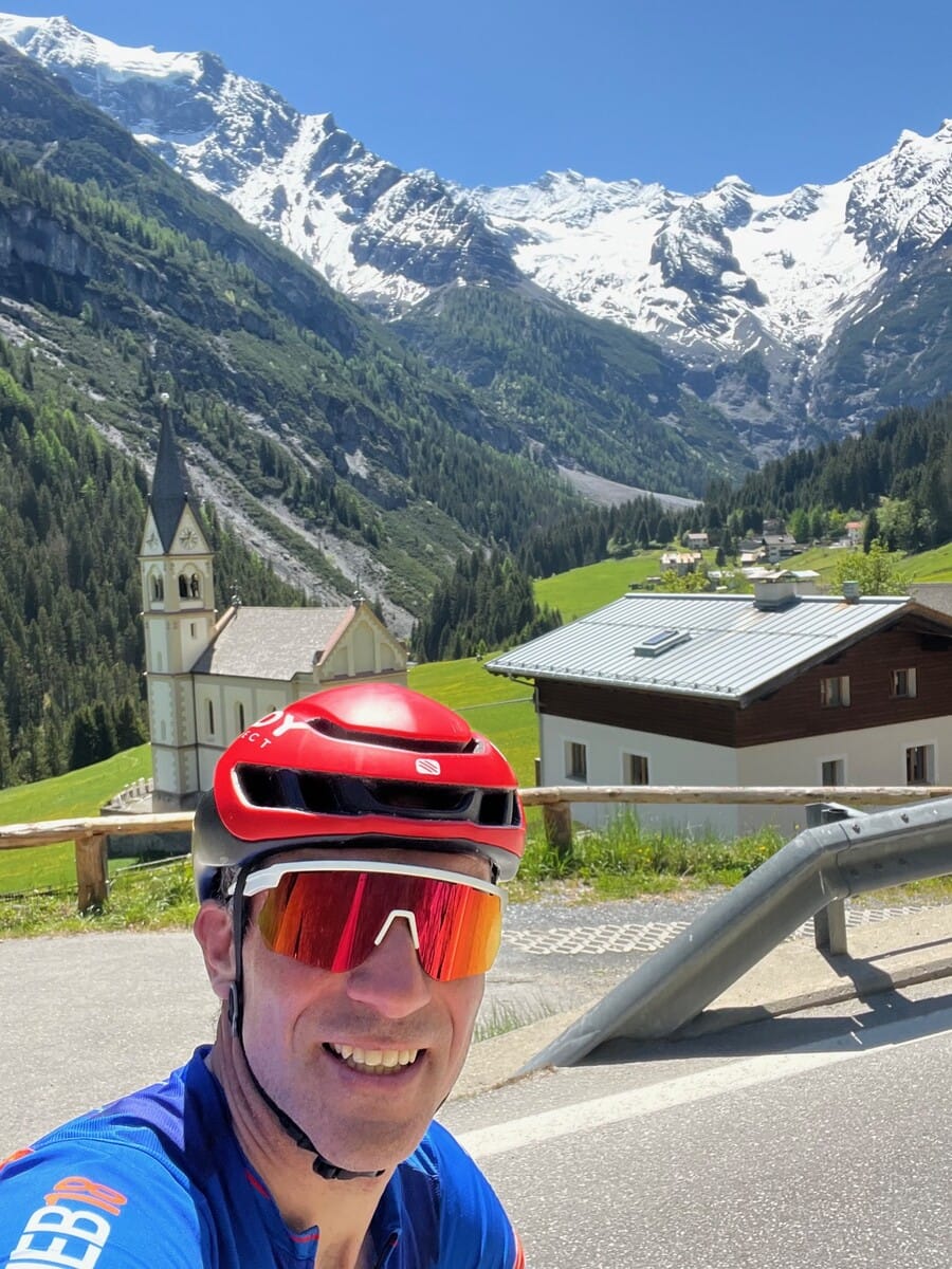 Selfie with snow-capped peaks near the Stelvio Pass
