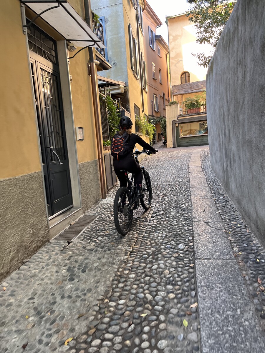 Cyclist approaching the entrance of the private winery